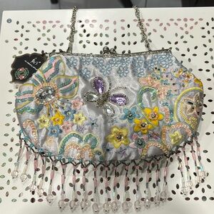 In’s boho bedazzled evening clutch